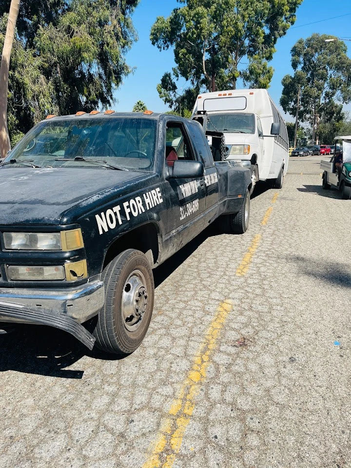 Old truck on the road with Not for Hire sign.