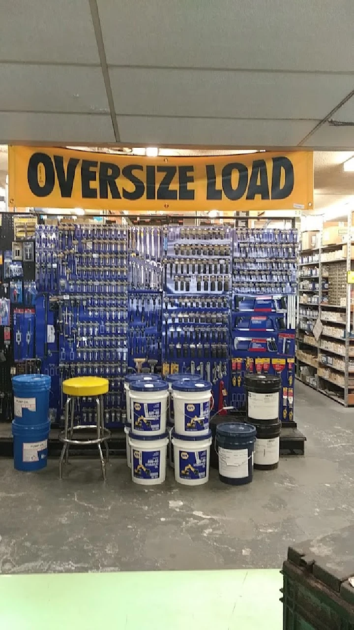 Tool display with OVERSIZE LOAD sign above.