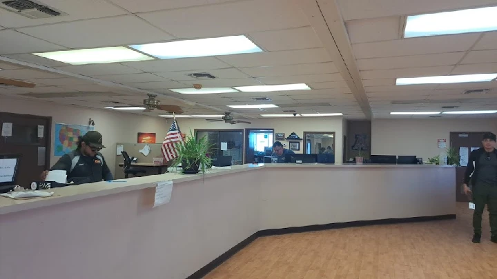 Reception area of Best Auto Salvage with staff.