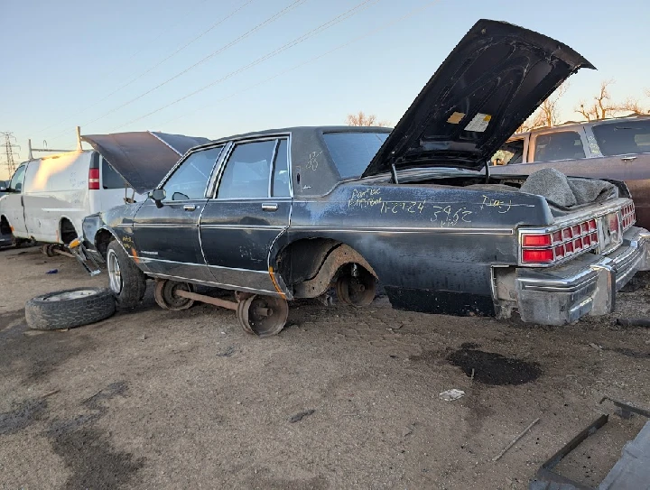 Abandoned car at Riverside Salvage Inc yard.