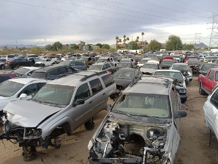 Aerial view of a large auto wrecking yard.