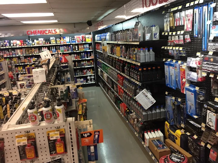 Aisle filled with automotive supplies and chemicals.