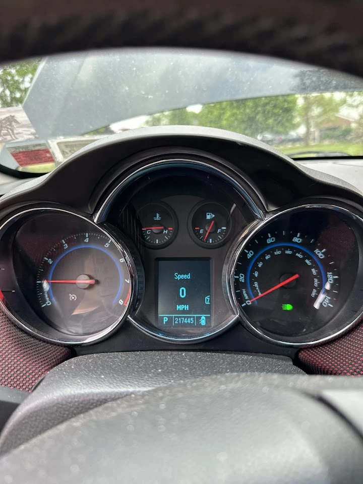 Car dashboard showing speedometer and odometer.