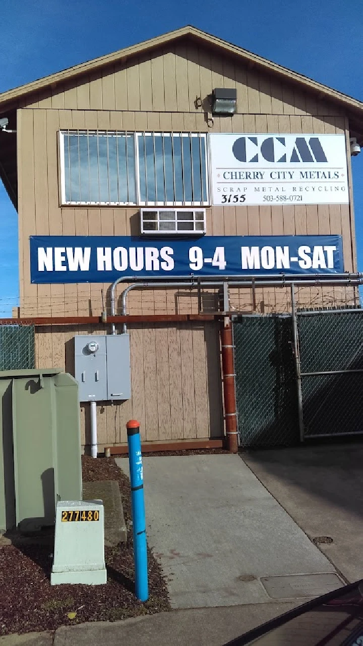 Cherry City Metals sign showing new hours.