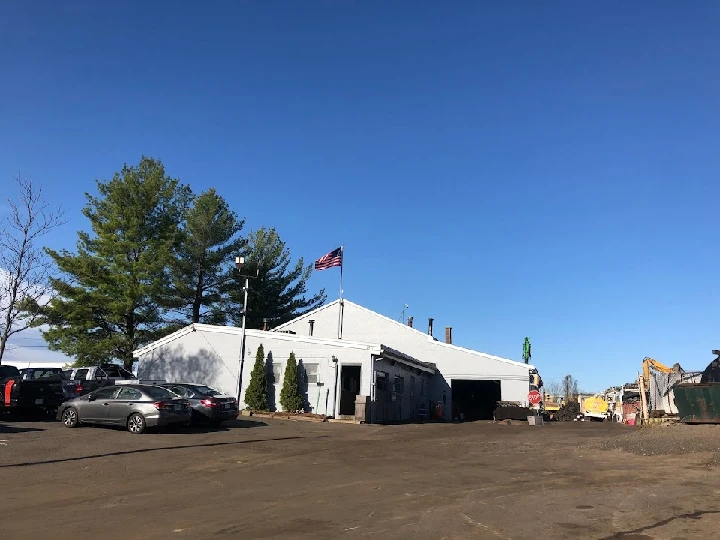 Chet's Scrap Metal location with clear blue sky.