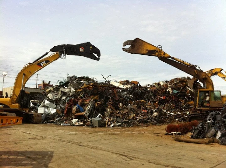 Heavy machinery at a metal recycling facility.