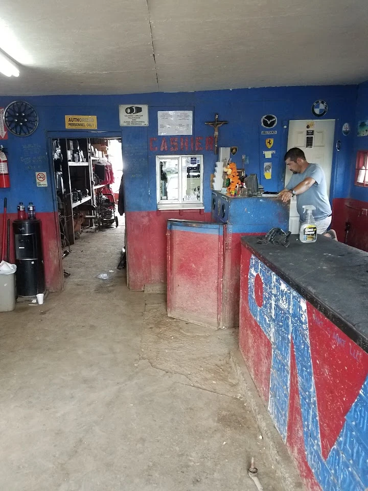 Interior of PART S MART LLC with a cashier.