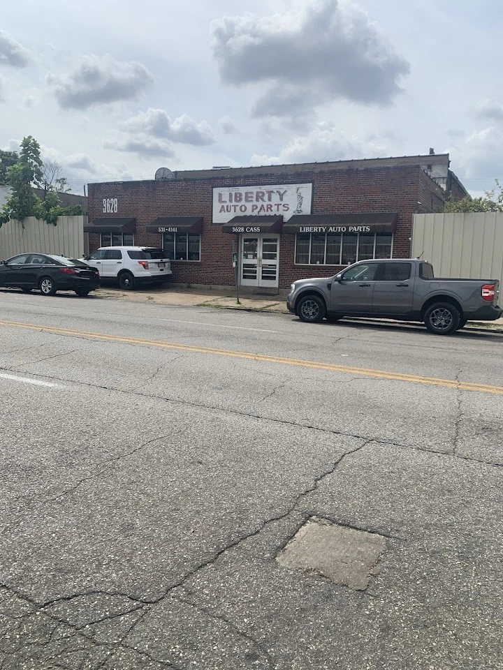 Liberty Auto Parts storefront on a quiet street.