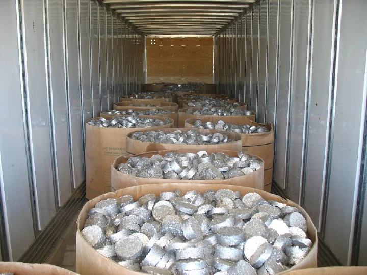 Metal containers filled with silver materials.