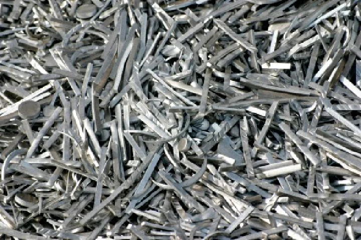 Metal scrap materials in a recycling pile.