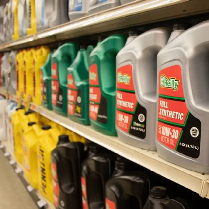 Oil containers on a store shelf at O'Reilly Auto Parts.