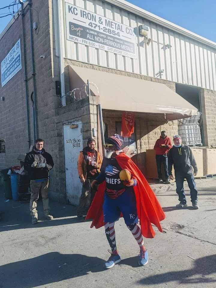 Person in costume at KC Iron & Metal Co. site.