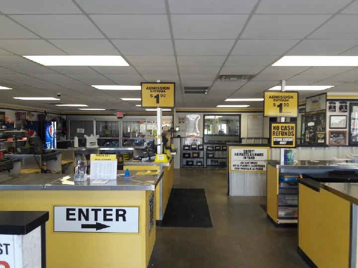 Pick-n-Pull store interior with admission signs.