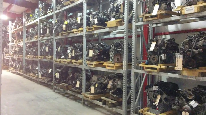 Shelves filled with used auto engines at Fenix Parts.