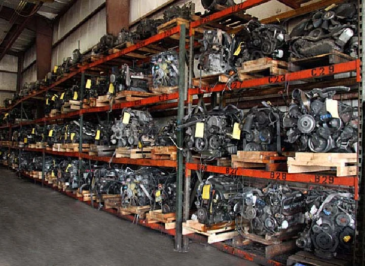 Shelves of used truck and van engines for sale.