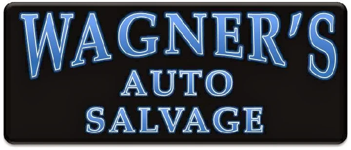 Wagner's Auto Salvage sign in bold lettering.