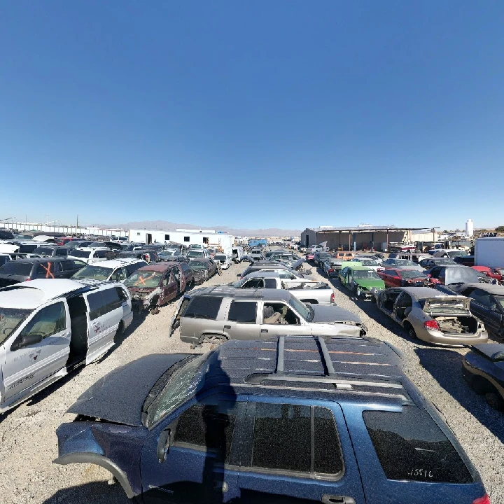 A view of a sprawling auto junkyard.