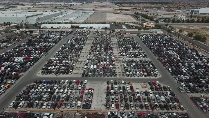 Aerial view of a large auto salvage yard.