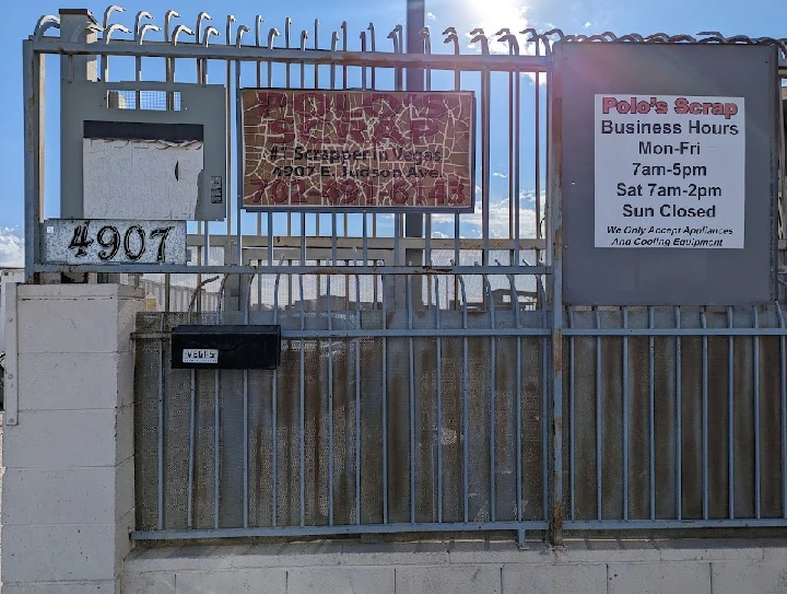 Polo's Scrap entrance with business hours displayed.