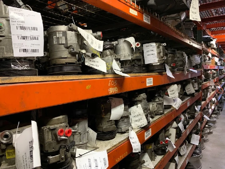 Row of auto parts on shelves at B&R Auto Wrecking.