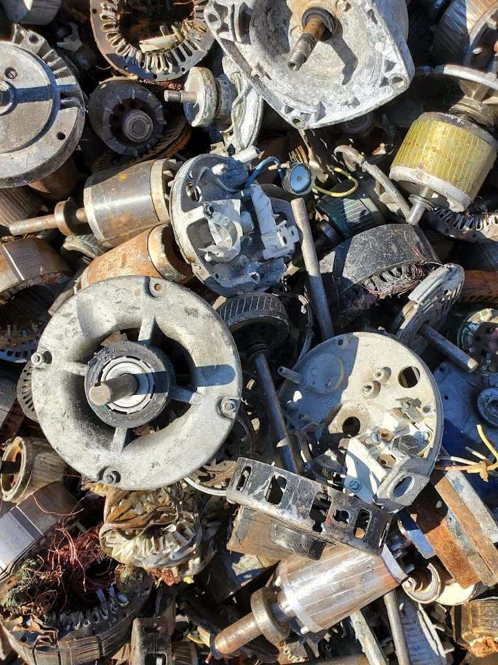 Scrap metal and electric motor parts pile.